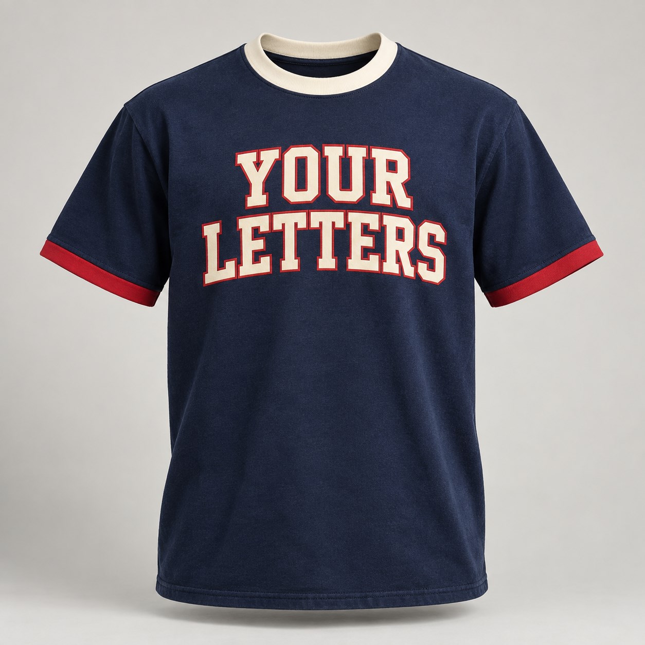 Navy T-shirt design concept with ivory YOUR LETTERS chest print and red trim